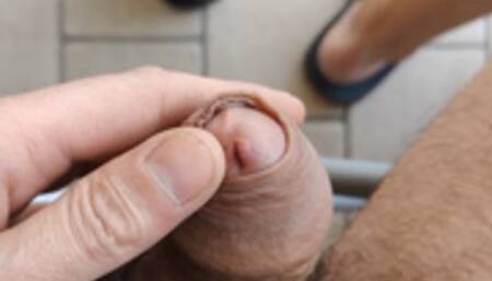 Flaccid cock outdoors, ball fetish and widened urinary meatus (avi)