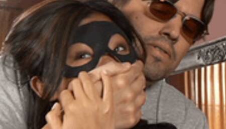 Sneaky cat burglar gets caught and now sits tied up awaiting the cops arrival!