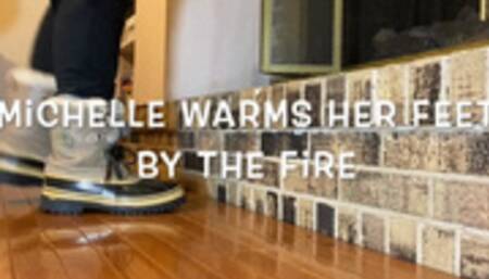 Michelle Warms Her Feet by the Fire