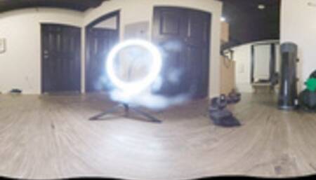 Putting on her green tights on the bed