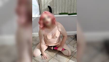 Caged tv crossdresser brought to orgasm