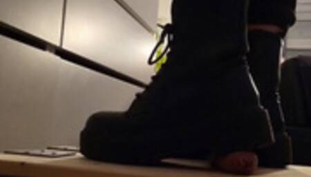 Cockcrush on cockboard with hot combat boots