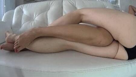 Lots of legs and feet rubbing laying on the sofa 2M d