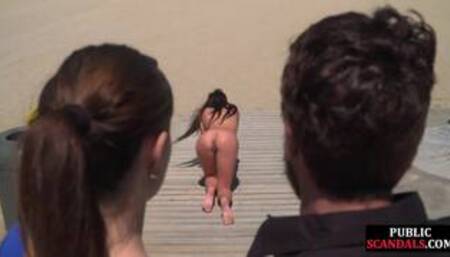 Scandalous slut walks naked outdoor in front of people