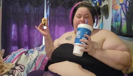 Huge double bacon cheeseburger, onion rings, strawberry cheesecake milkshake