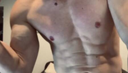 Devon flexing his muscles up close SD