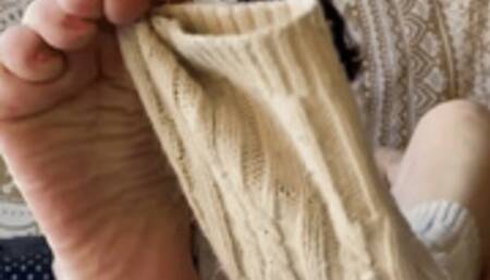 Milf tease pulling off legwarmers, red toes, foot fetish