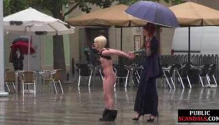 Public perverted naked slut seduced by BDSM lady outdoor