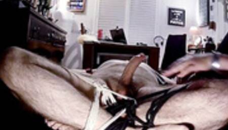 Edging handjob on a naked man tied with legs in the air-BBW domination,BBW bondage,male bondage,man in bondage,amateur,man tied up,pre cum,handjob,strapped down,edging,edged,close up,suspension,suspended