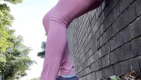 Pink leggings wetting peeing by the road