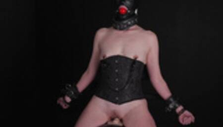 Cora rides the Sybian while bound and squirts a heck of a lot