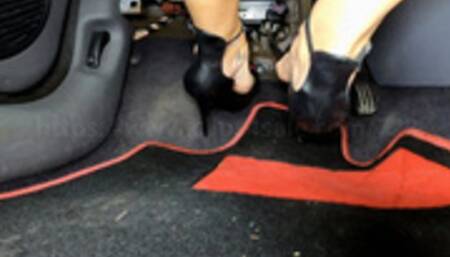 Mme Georgia drives and plays with the car in Black Sandal - Feet POV