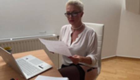 Tuff sexy smoking secretary in garter belt, stocking and black High heels