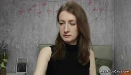 Brunette amateur with naked shoulders on webcam