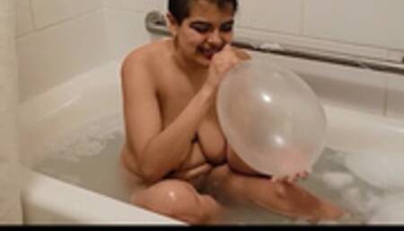Hot Latina Blows Up Condom in Bubble Bath
