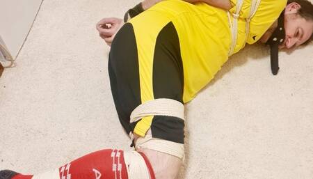 Footballer tied up for over 7 hours 2 -BBW domination, BBW bondage,bound and gagged man,man tied up,amateur,male bondage,man in bondage,soccer kit,football kit,socks,rope bondage,gay bondage,