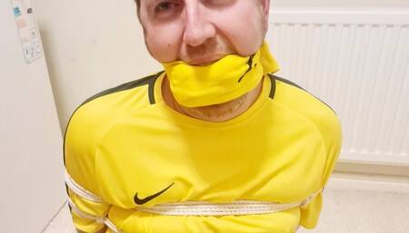 Footballer tied up for over 7 hours 1 -BBW domination, BBW bondage,bound and gagged man,man tied up,amateur,male bondage,man in bondage,soccer kit,football kit,socks,rope bondage,gay bondage,