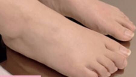 Taylor Presses Her Feet Against a Mirror