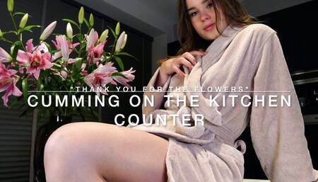 Cumming on the kitchen counter