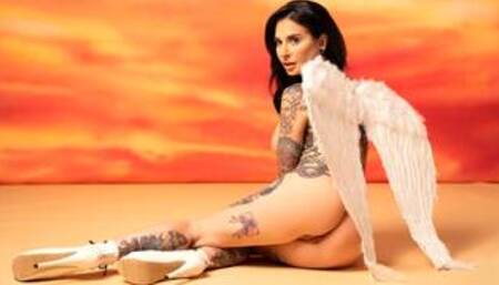 Busty MILF Joanna Angel shows her luscious body with tattoos for Playboy