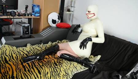 Shemale Latexbabe teasing in white latex dress, ballet boots and medical mask