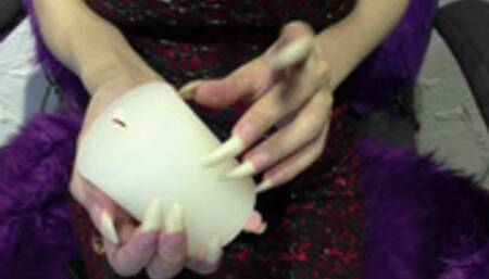 Nails Scratching a candle