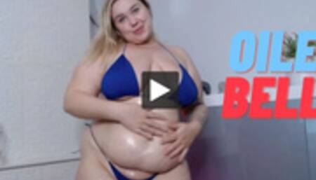 Bbw oiled up here belly and spanked herself on the stomach like a drum