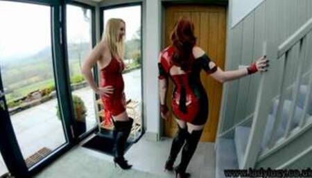 Lucy Gresty and Red (Red XXX) on a grey coloured staircase in a lesbian scene