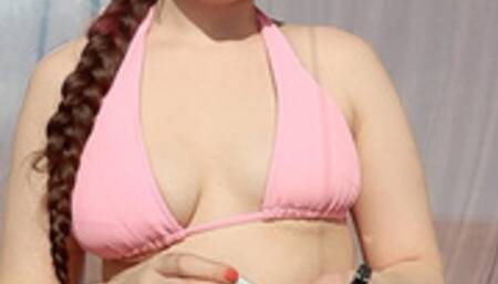 Smoking a marlboro wearing a bikini