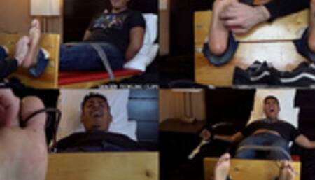 Carlos Tickled in the Stocks