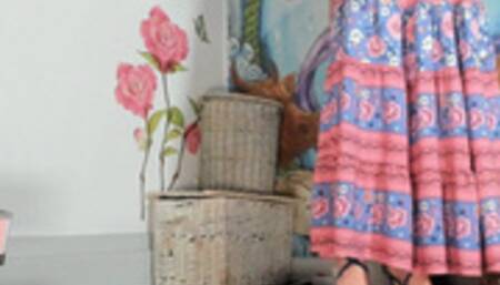 Squatting in long flower skirt