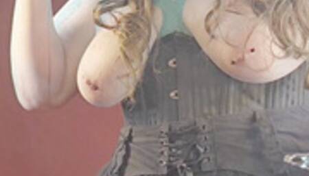 Goth girlfriend moans as she plays with her nipple clamps