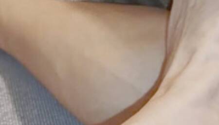 Barefoot on hotel couch