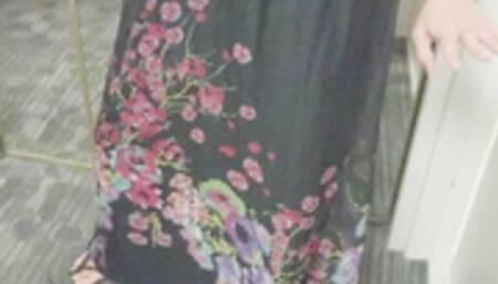 Tempest showing in black floral dress