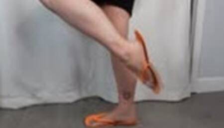 Calf Muscle Flex in Orange Flip Flops MP4 640 Silent Clip