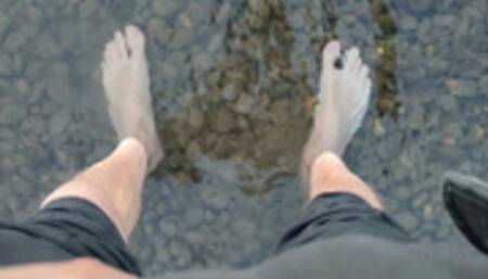 Sweaty, filthy and smelly feet in the river (avi)