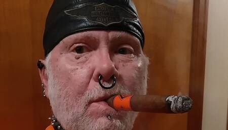 Mistress LeatherBikerGena Enjoying a Cigar and Chatting with Her Fans