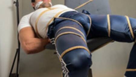 Trainer Esteban in Bondage