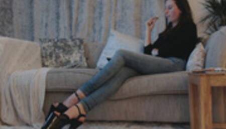 Human footstool relaxing 8 inch sandals (MOV)