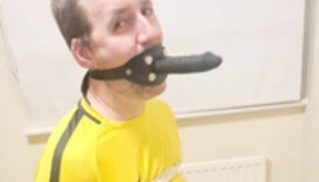Dildo gagged footballer -BBW domination, BBW bondage,bound and gagged man,man tied up,amateur,male bondage,man in bondage,soccer kit,football kit,socks,rope bondage,gay bondage,dildo gagged,