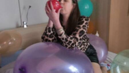 Sophie sit on a big doll balloon, blowing and nails popping Belbal 14