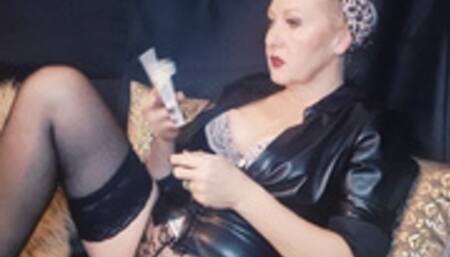 Smoker Stepmum smoking sexy seductive Vogue Whitefilter Slim in her leather blouse, black lace bra and black stockings