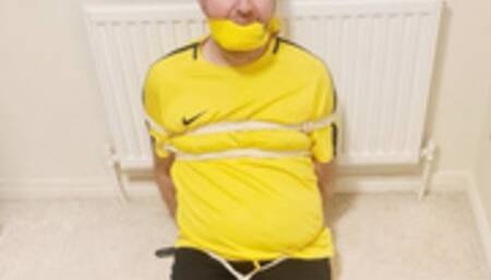 Preview of footballer tied up for over 7 hours 2 -BBW domination, BBW bondage,bound and gagged man,man tied up,amateur,male bondage,man in bondage,soccer kit,football kit,socks,rope bondage,gay bondage,