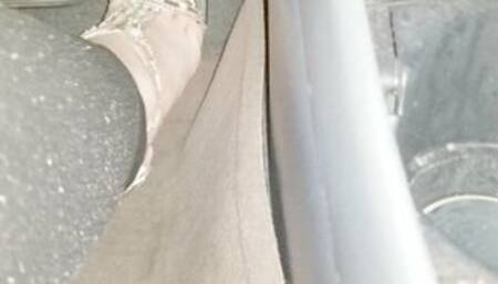 My crossed dressed feet pumping my pedals