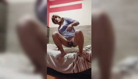 Sasha Sticks a Bottle up Her Ass