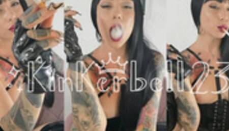 Human ashtray wearing PVC and Leather gloves