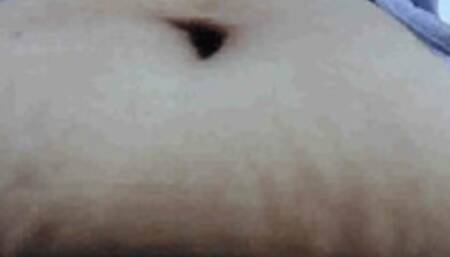 pretty in purple under Latina milf Giantess Bouncy bloated Belly Bouncy as she walks while occasionally fingering her BellyButton in a crop top avi