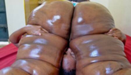 Crushed between fat granny thighs