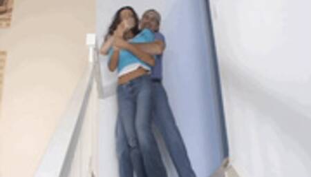 Bound and gagged at the top of a stairway, courageous Shamron carefully edges down the stairs!