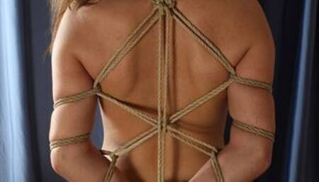 Cheryl: topless barefoot girl in black panties, tied sitting on the table, is teased, tickled and played with vibrator by camera man (HD WMV)